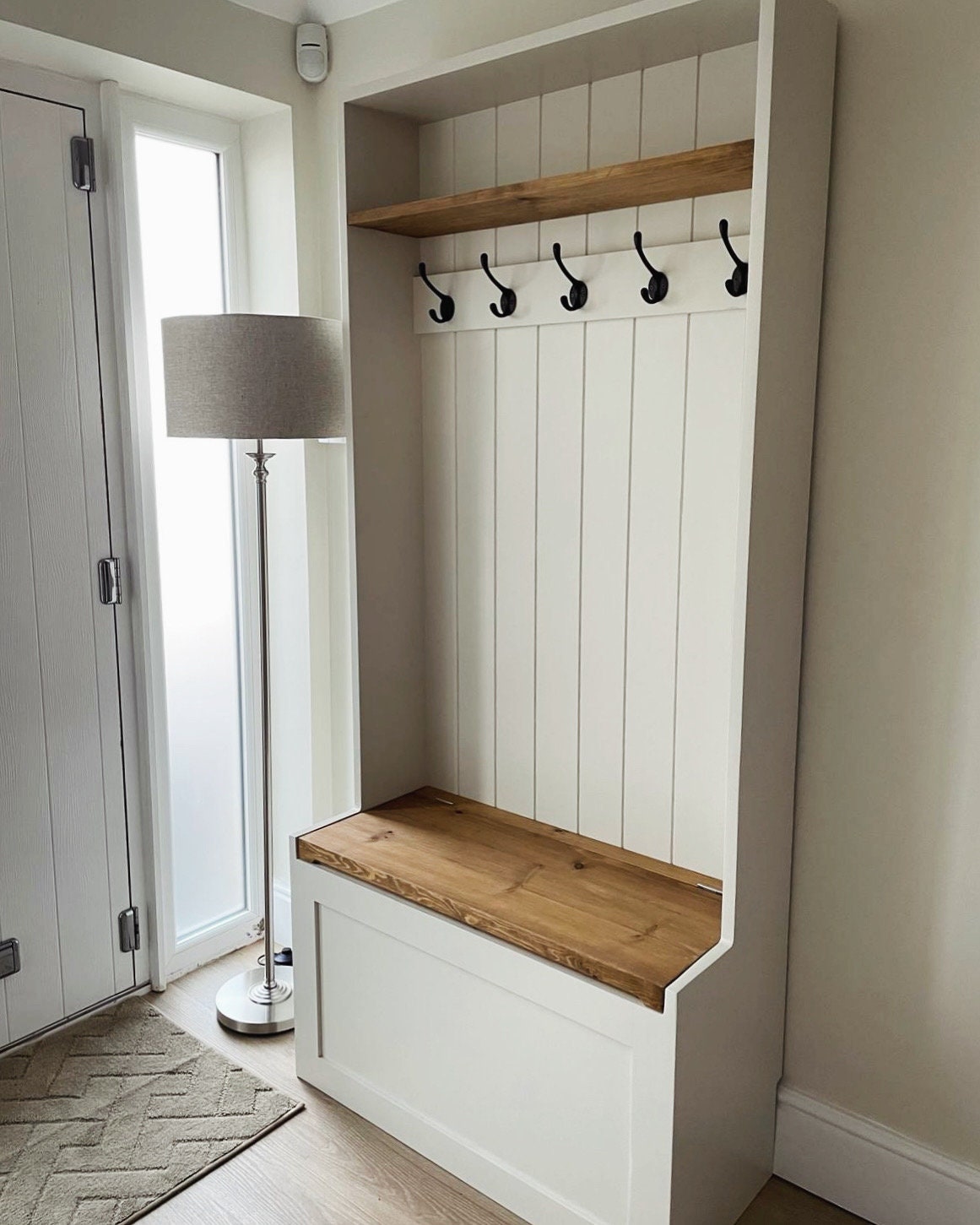 Hall bench with 2024 storage and hooks