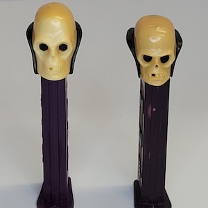 Lot 2 1971 Dr. Skull Pez Dispenser Yugoslavia Purple Base Candy Pusher Halloween