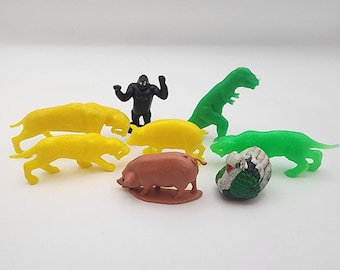 Lot of 6 Vtg Plastic Miniature Figurines Smilodon Gorilla Pigs Turkey Dinosaur