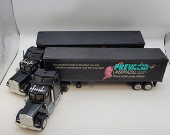 Lot of 2 Prevacid Haulers 1:64 Pharmaceutical Advertising Diecast Plastic Trucks