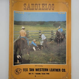 May include: A vintage "Saddlelog" catalog cover featuring a rural scene with cowboys and cattle. The cover is a warm yellow-orange with the title in large, brown letters. The catalog includes the text "TEX TAN WESTERN LEATHER CO."