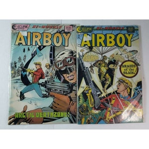 May include: Two vintage "Airboy" comic books. The covers feature action-packed illustrations of soldiers, aircraft, and the title character. One cover reads "Arctic Deathzone!" and the other reads "Armies of the Slain."