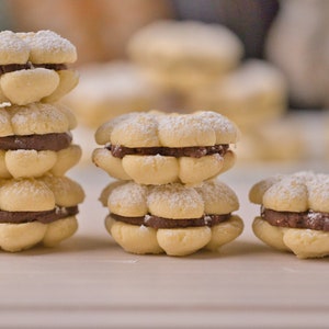 Ultimate Butter Cookie Sandwich, 2 dozen Cookies filled with delicious Belgium chocolate ganache. melt in your mouth image 1