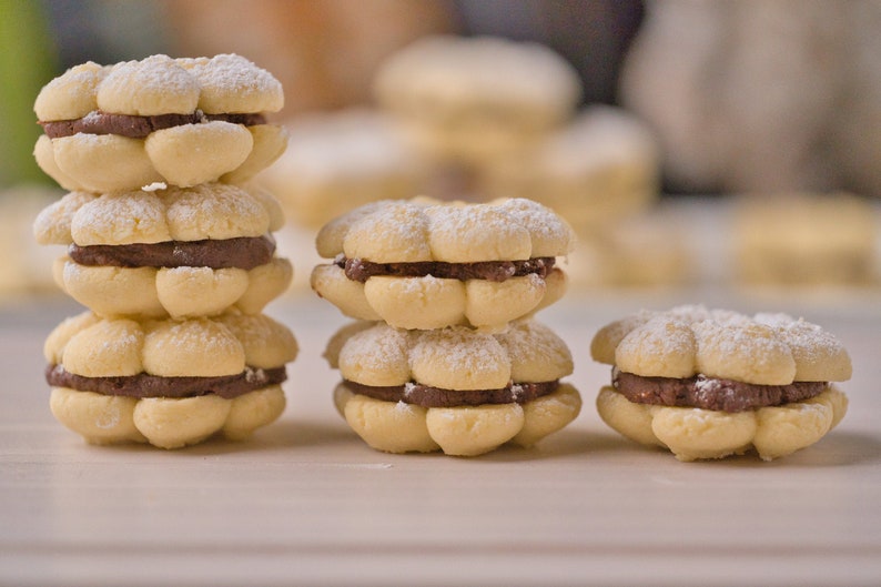 Ultimate Butter Cookie Sandwich, 2 dozen Cookies filled with delicious Belgium chocolate ganache. melt in your mouth image 1