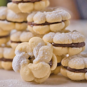Ultimate Butter Cookie Sandwich, 2 dozen Cookies filled with delicious Belgium chocolate ganache. melt in your mouth image 2