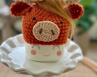 Sombrero de taza con forma de vaca de montaña, calabaza y malvavisco