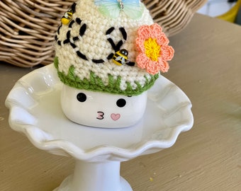 Sombrero de taza de malvavisco del Jardín Encantado