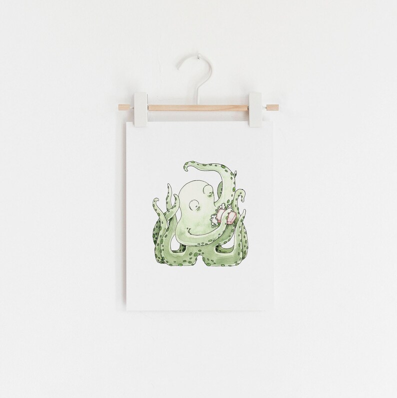 May include: A watercolor illustration of a green octopus holding a pink seashell. The octopus has a light green body and dark green spots. The seashell is a light pink color with a darker pink stripe.
