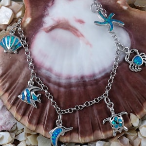 Silver Sea life charm Bracelet 7 1/4&quot; .925 Sterling Rhodium plated Opal Dolphin, sea turtle, Starfish, scallop, angelfish Fast free shipping