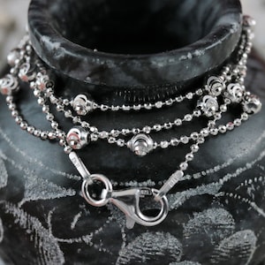 Zilveren 1 mm kralenketting gerhodineerd .925 sterling rond diamantgeslepen kralenketting cadeau. Karabijnsluiting Made in Italy, snelle en gratis verzending
