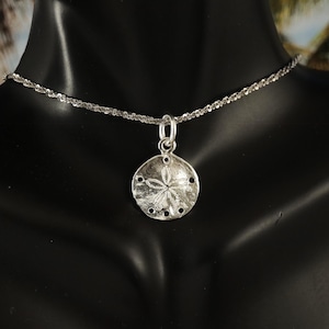 Silver Sand Dollar Charm, 5/8&quot; tall + 1/4&quot; oval jump ring high polished .925 Sterling pendant souvenir. fast Free Shipping,