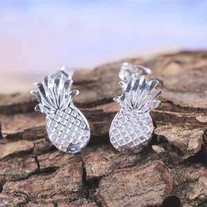 Sterling Silver, Diamond cut, small pineapple stud earrings, 1/2" long x 1/4" wide