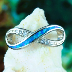 Silver Opal infinity ring, 1/4" tall 3/4" wide Rhodium plated .925 Sterling blue Opal CZ wavy shape ring. gift for her fast free shipping