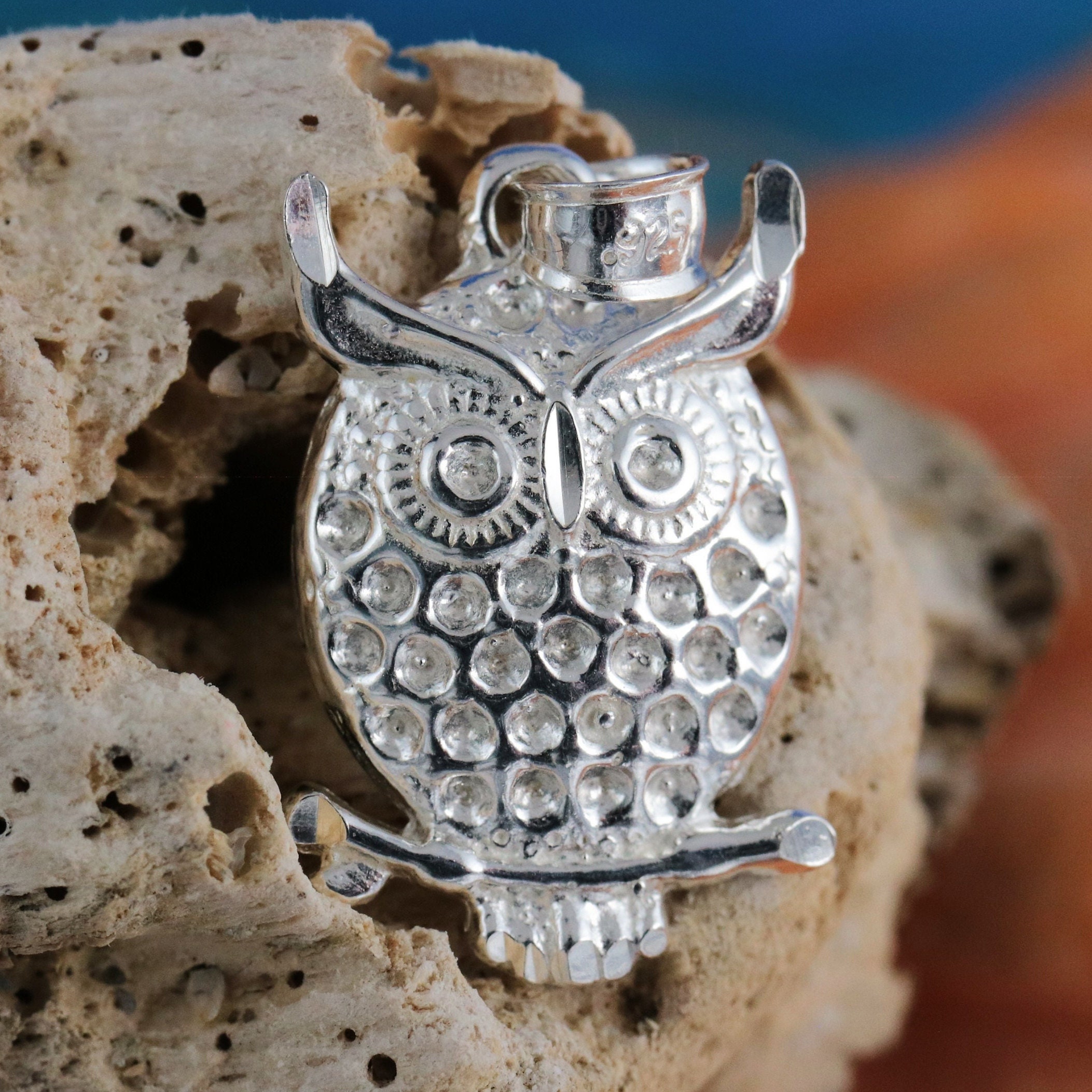 Sterling Silver Diamond cut Owl pendant, 11/16" + 1/4" bail. sitting on a perch.