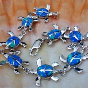 Silver Sea turtle bracelet. 7 3/8&quot; long, 11/16&quot; wide .925 Sterling Silver, blue Opal, Rhodium plated. Lobster claw lock. fast free shipping