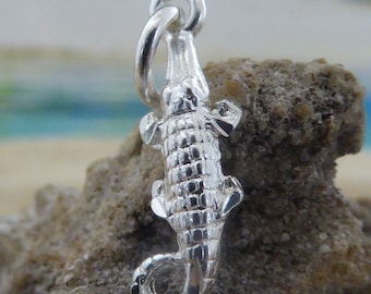 Silver alligator charm, 11/16" long + 1/4" bail. Diamond cut .925 Sterling
