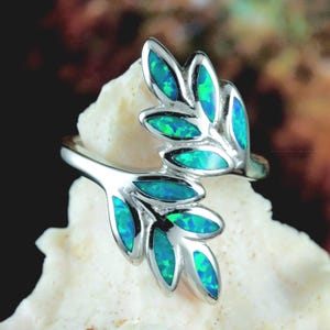 Sterling Silver, Rhodium Finish, blue Opal, Wrap Leaf Ring. 1" tall x 2.5 mm shank