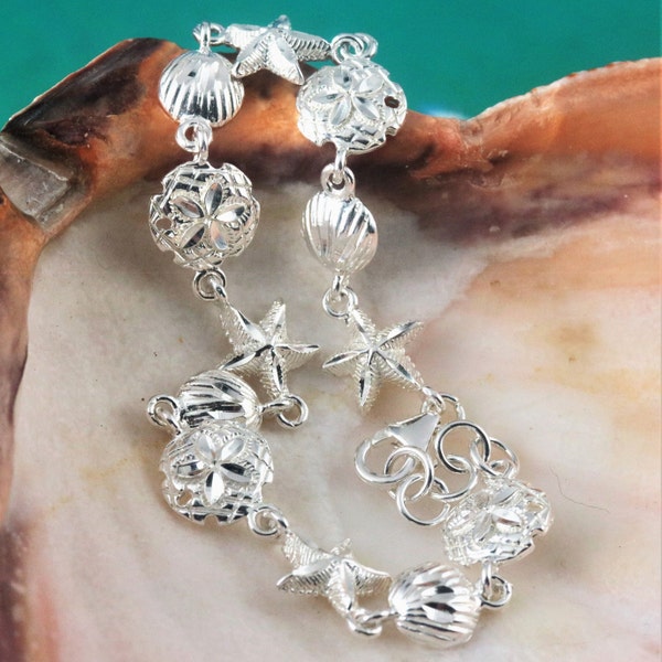 Silver sea life Bracelet, 7 1/2"+ 1/4" .925 Sterling Diamond cut starfish, shell, sand dollar souvenir gift fast free shipping, lobster claw