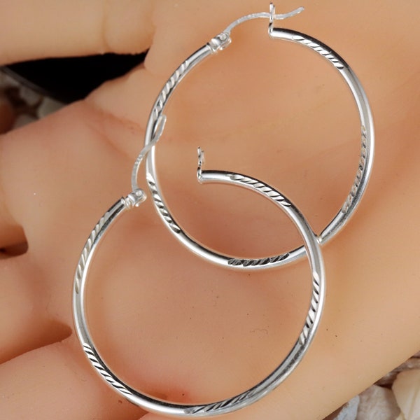 2.5 mm Silver hoop earrings. Diamond cut. 7 sizes. From 30 mm-75 mm .925 Sterling lightweight lever back hoop earrings • free fast shipping