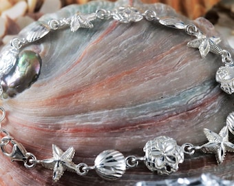 Sterling Silver Diamond cut combo sea Life link Bracelet: 7 1/2"+ 1/2" ext.