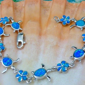 Sterling Silver, Rhodium plated, Blue Opal Sea Turtle / Plumeria flower combo, link Bracelet. 7"
