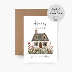 May include: A greeting card with a watercolor illustration of a house with a stone chimney and a brown door, surrounded by colorful flowers. The card reads "Happy New Home" and "Johnny Natti & Henri". A brown envelope is visible.