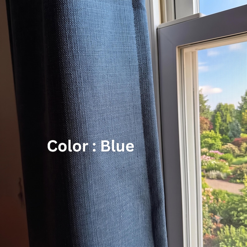 May include: A blue curtain panel with a visible woven texture hanging vertically next to a window frame. The fabric features a consistent deep blue hue and a structured weave pattern. The text Color : Blue is printed on the curtain fabric.