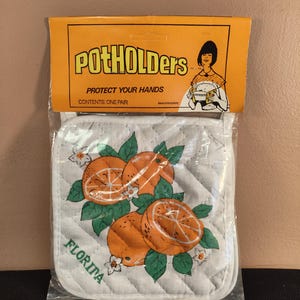 May include: A rustic wooden sign with the text "Welcome to our porch" in white lettering. The sign features a distressed finish and a simple, inviting design, perfect for outdoor decor.