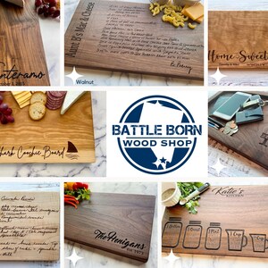 May include: A collection of wooden cutting boards with various designs and text. Some boards feature engraved text like "Santeramo," "Aunt B's Mac & Cheese," and "Shark Coochie Board." Other boards have kitchen-themed designs and personalized engravings.