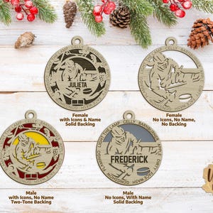 May include: Four circular wooden hockey-themed ornaments featuring a laser-cut hockey player silhouette. The designs include variations with and without names like JULIETA and FREDERICK, different colored backings, and text borders reading LIGHT THE LAMP, CELLY, BARNBURNER, APPLE, DIRTY, FACE WASH, GONGSHOW, and FLAMINGO.