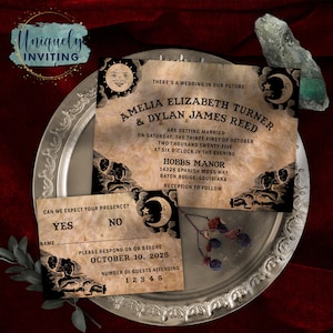 May include: A vintage-style wedding invitation with a dark brown background and black text. The invitation features a crescent moon and stars, and the text reads "There's a wedding in our future Amelia Elizabeth Turner & Dylan James Reed are getting married on Saturday, the thirty-first of October two thousand twenty-five at six o'clock in the evening Hobbs Manor 14328 Spanish Moss Way Baton Rouge, Louisiana Reception to follow". A separate RSVP card features a similar design and the text "Can we expect your presence? Yes No Name Please respond on or before October 10, 2025 Number of guests attending 1 2 3 4 5".