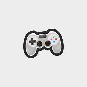 May include: A white video game controller with black buttons and a black outline. The controller has a directional pad, four face buttons, and two analogue sticks.