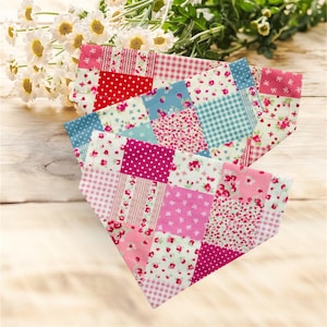 May include: Two patchwork bandanas in a variety of patterns, including polka dots, floral prints, and gingham checks. The bandanas feature a colour palette of pink, red, and blue hues. White daisies are in the background.