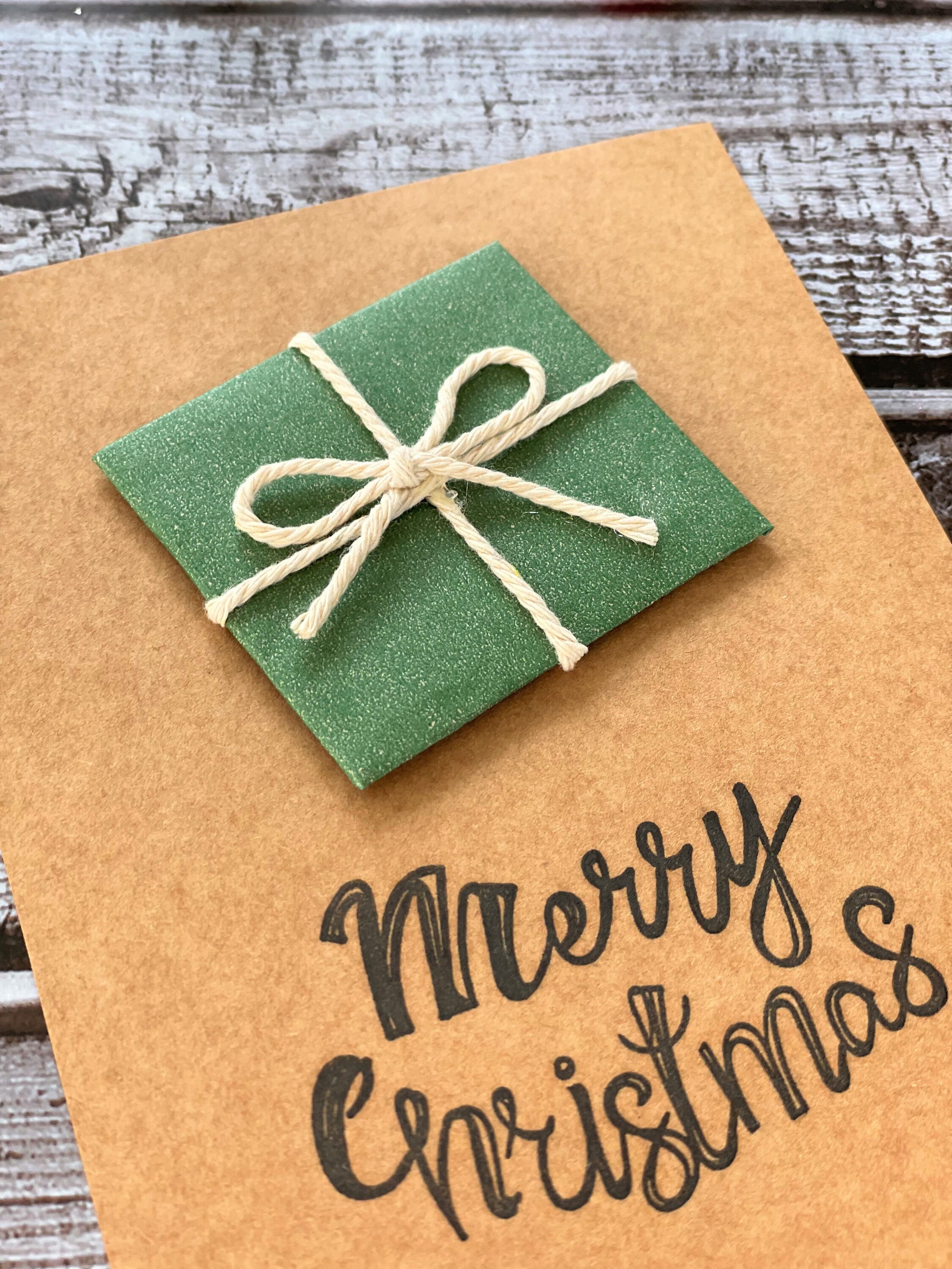 Green Brown Paper Package Tied up With String Merry