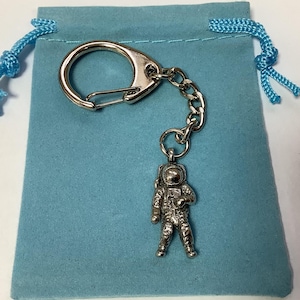 Zilveren tinnen astronaut-sleutelhanger (b) - in prijs verlaagd