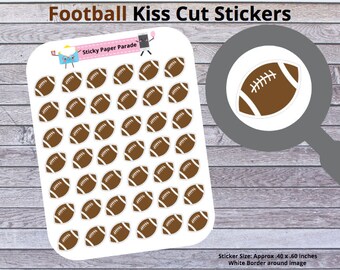 May include: A sheet of brown and white football kiss cut stickers with a white border around each image. The sheet features the text Football Kiss Cut Stickers and Sticky Paper Parade. Each individual sticker measures approximately .40 x .60 inches.