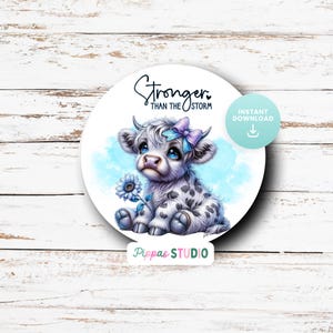May include: A white and black spotted calf with blue eyes and a blue bow sits on a blue and white background. The text "Stronger Than The Storm" is above the calf. The text "Instant Download" is in the upper right corner of the image.