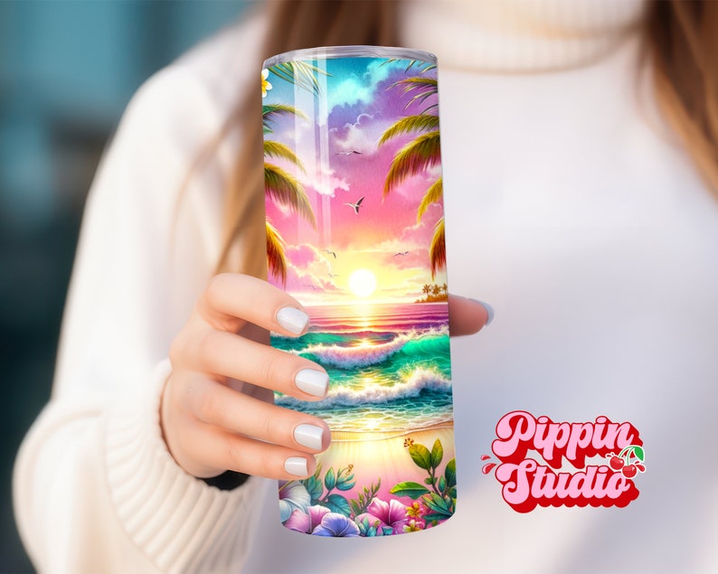 May include: A stainless steel tumbler with a colorful sunset beach scene. The scene features palm trees, a beach, ocean waves, and a pink and orange sunset. The tumbler is perfect for enjoying your favorite beverage.