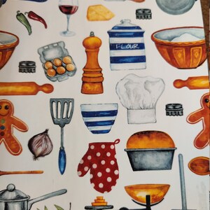 May include: A white background with a variety of kitchen and baking items, including a rolling pin, a red oven mitt, a bowl of flour, a gingerbread man, a chef's hat, a glass of red wine, a pepper mill, a scale, a loaf of bread, a spatula, a measuring cup, a jar of flour, a bowl of dough, a cookie cutter, a sprig of olives, a pot, a ladle, and a set of eggs.