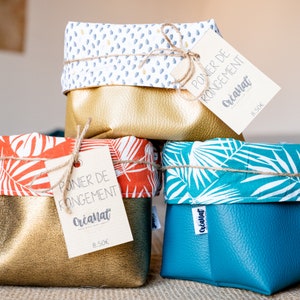 Fabric and faux leather storage baskets