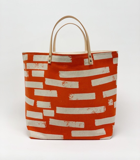 Red tape leather bags sale