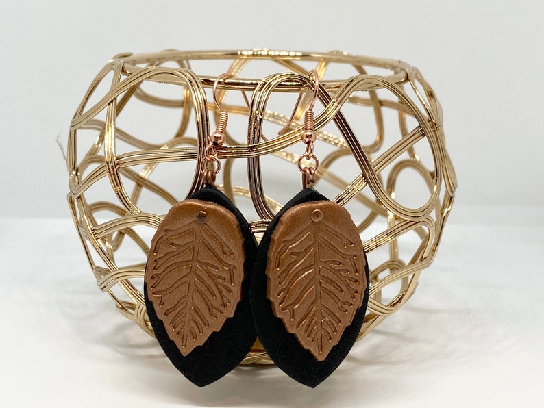Copper leaf dangle earrings