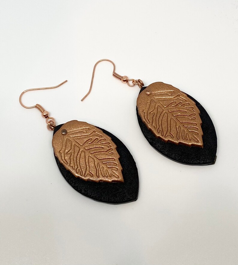 Copper leaf dangle earrings