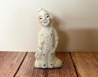 Figura vintage kitsch de payaso músico de porcelana
