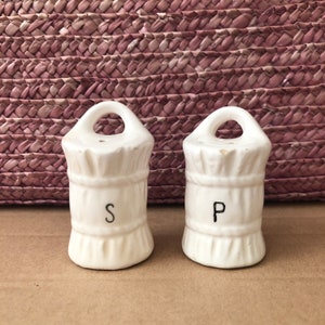 White barrel ceramic salt & pepper shakers