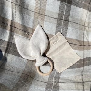 May include: A rustic wooden sign with the text "Welcome to our home" in a handwritten style. The sign features a distressed finish and a simple, inviting design, perfect for entryway decor.