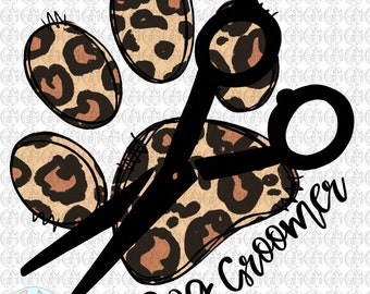May include: A black pair of scissors with a leopard print paw print design. The text "Dog Groomer" is written in black cursive below the scissors.