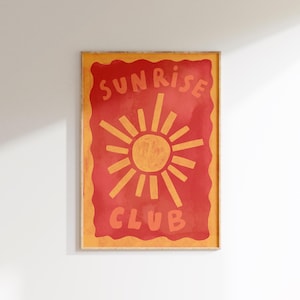 May include: A red and orange poster with a sun and the text "SUNRISE CLUB" in a wavy, hand-drawn font.