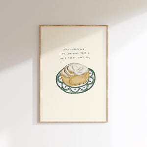 May include: A tan and white dog wearing a blue and white striped bandana. The dog has floppy ears and a friendly expression. The bandana is tied around its neck.