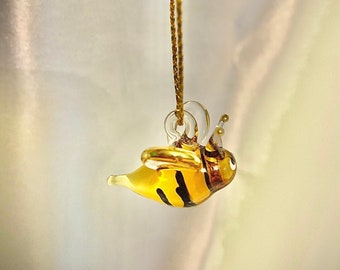 Tiny hanging honey bee